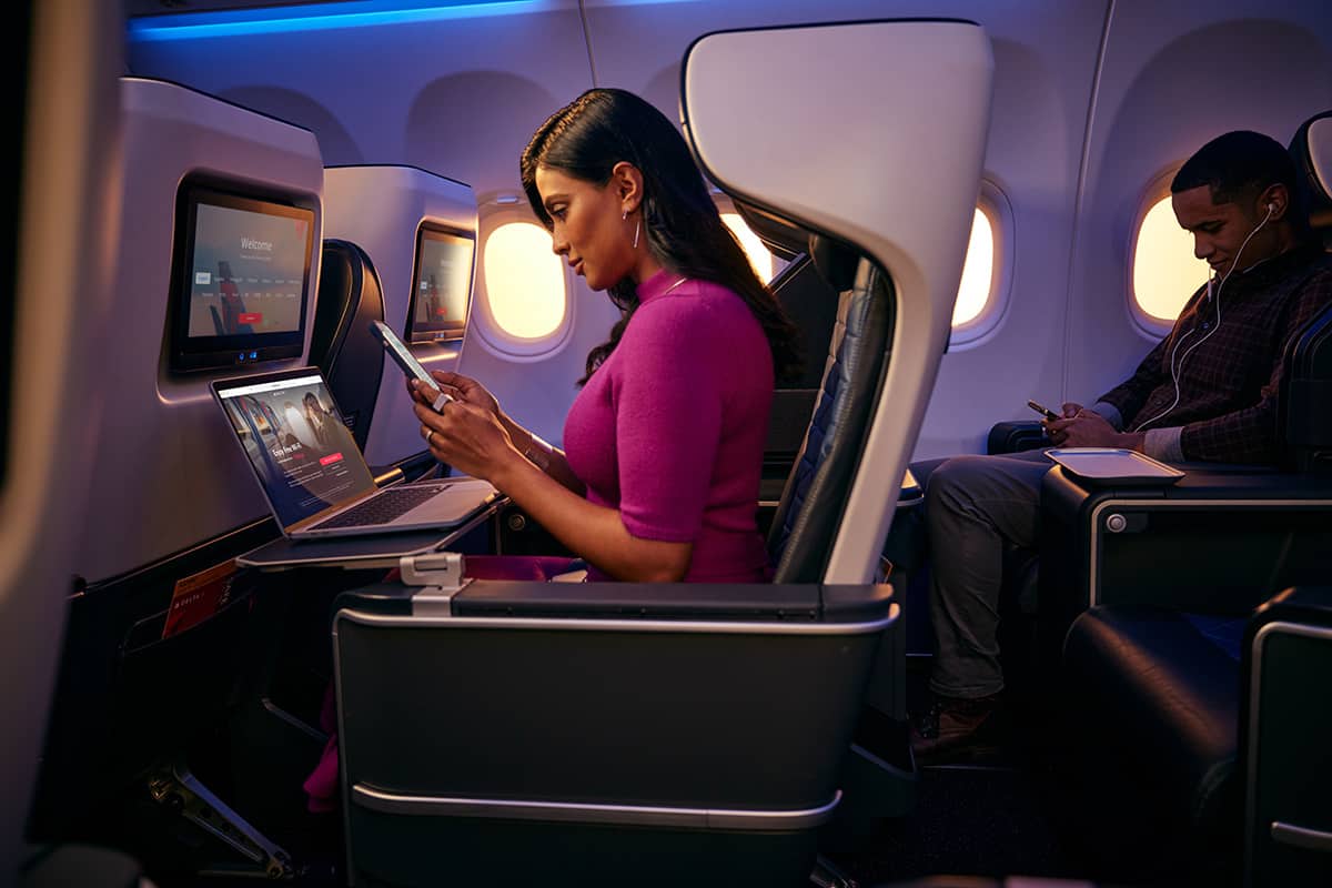 Traveller in business class, illustrative